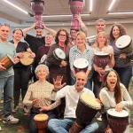Team building a mida amb tallers de música: com transformar equips a través del ritme